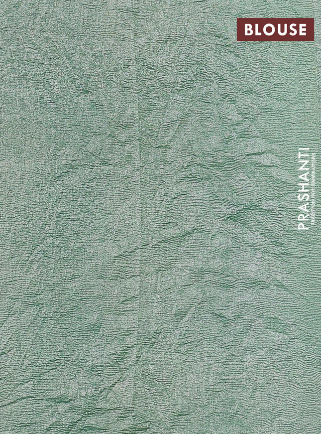 Munga silk saree pastel green with allover zari woven stripes pattern in borderless style