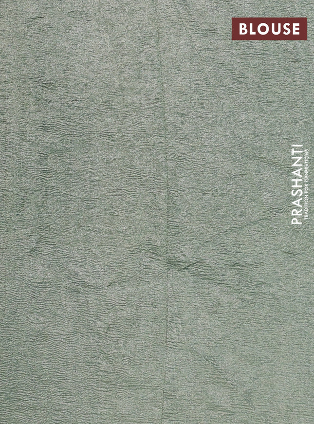 Munga silk saree pastel blue with allover zari woven stripes pattern in borderless style