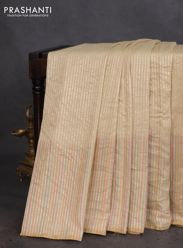 Munga silk saree sandal with allover zari woven stripes pattern in borderless style