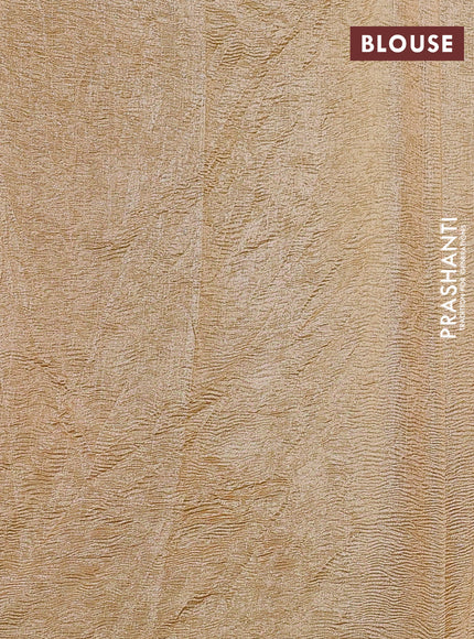 Munga silk saree pale yellow with allover zari woven stripes pattern in borderless style