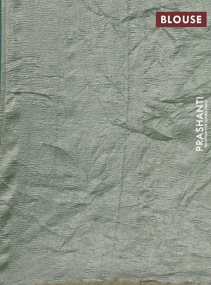 Munga silk saree pastel blue with allover zari woven stripes pattern in borderless style