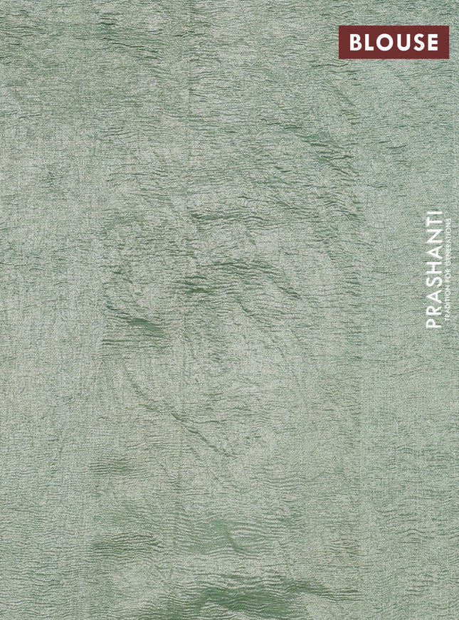 Munga silk saree pastel green with allover zari woven stripes pattern in borderless style