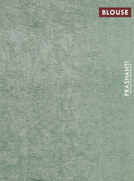 Munga silk saree pastel green with allover zari woven stripes pattern in borderless style