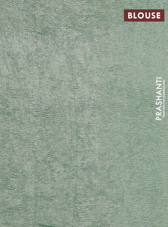 Munga silk saree pastel green with allover zari woven stripes pattern in borderless style