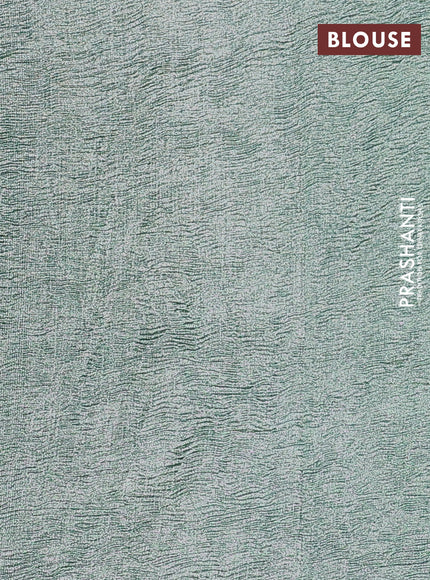 Munga silk saree pastel blue with allover zari woven stripes pattern in borderless style