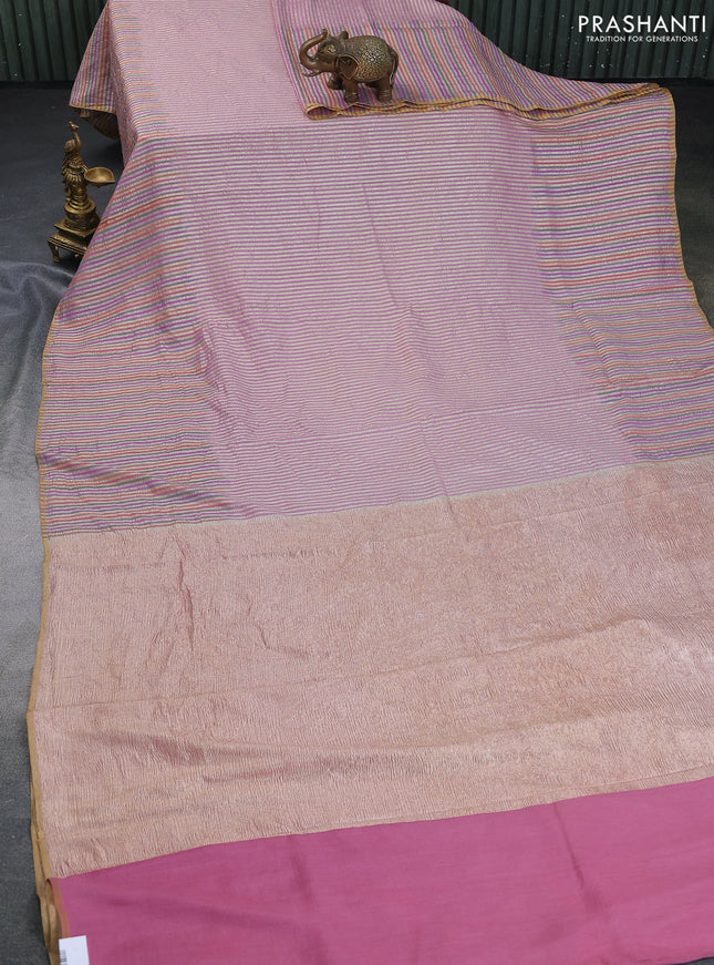 Munga silk saree pastel pink and multi colour with allover zari woven stripes pattern in borderless style