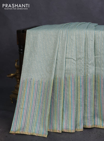 Munga silk saree pastel blue and multi colour with allover zari woven stripes pattern in borderless style