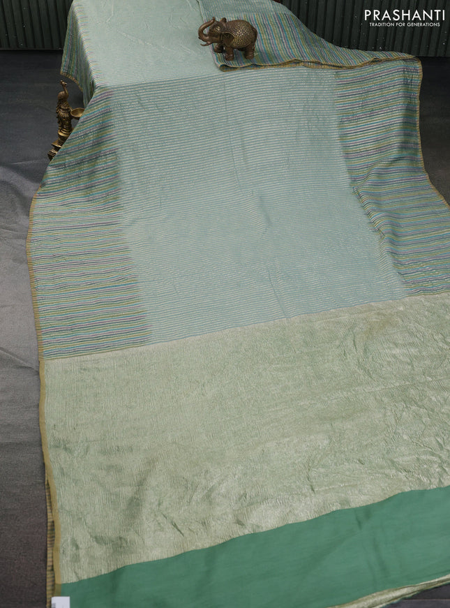 Munga silk saree pastel blue and multi colour with allover zari woven stripes pattern in borderless style