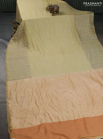 Munga silk saree pale yellow with allover zari woven stripes pattern in borderless style