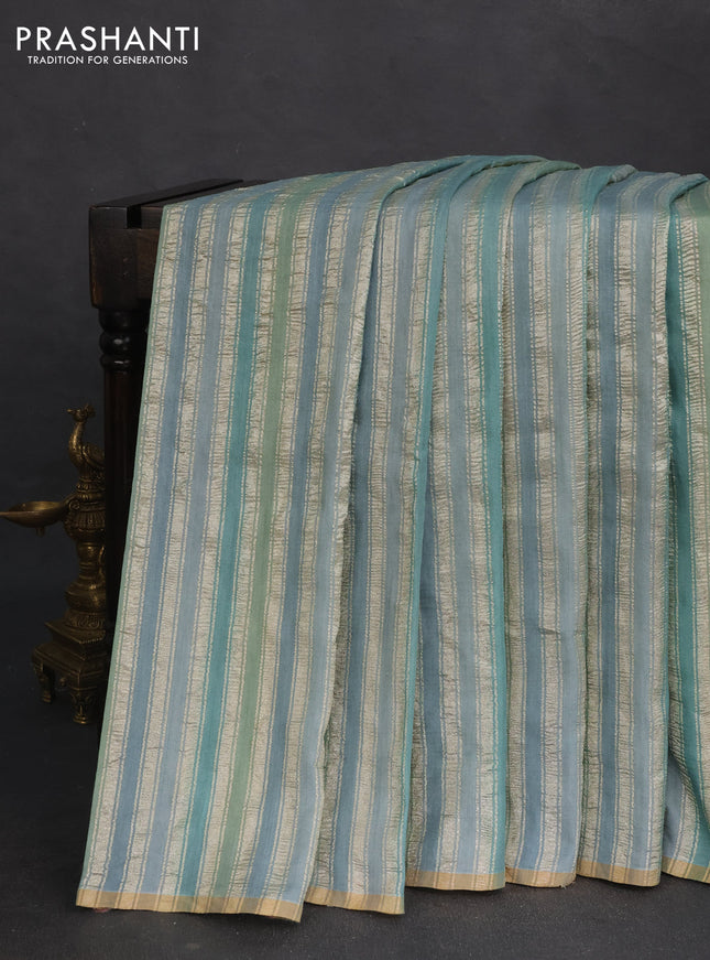 Munga silk saree pastel shade and pastel blue with allover rangart weaves in borderless style