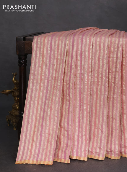 Munga silk saree multi colour and peach pink with allover rangart weaves in borderless style