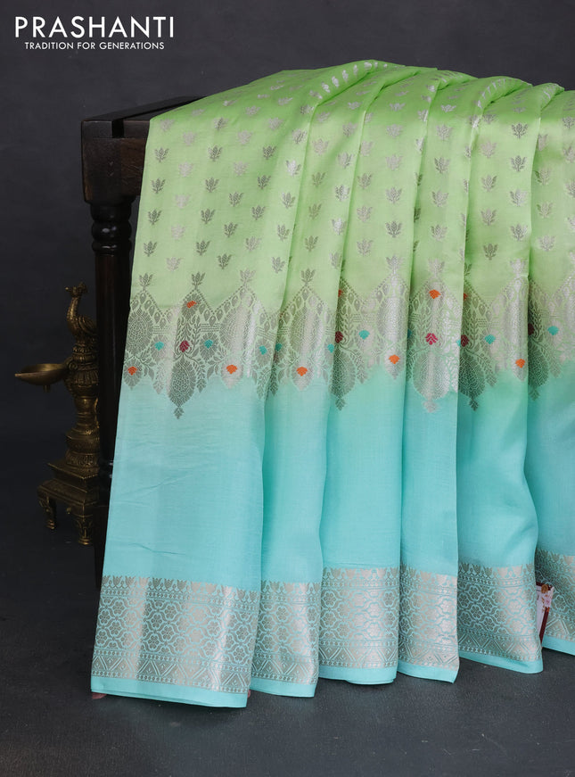 Banarasi poona silk saree light green and teal blue with allover silver zari woven buttas and silver long zari woven border