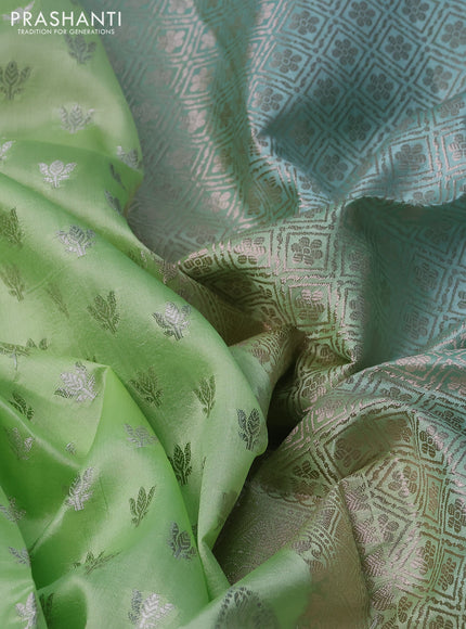 Banarasi poona silk saree light green and teal blue with allover silver zari woven buttas and silver long zari woven border