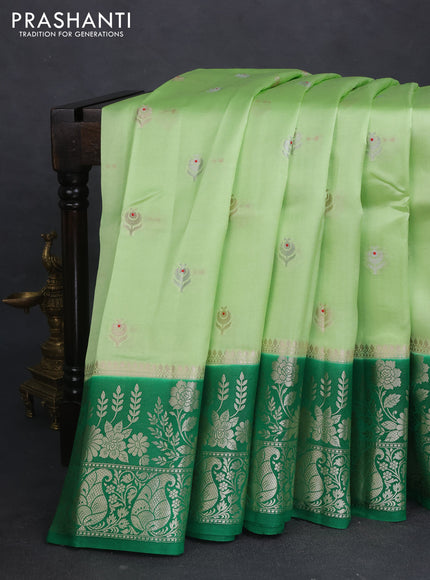 Banarasi poona silk saree pista green and green with silver & gold zari woven buttas and rich zari woven border