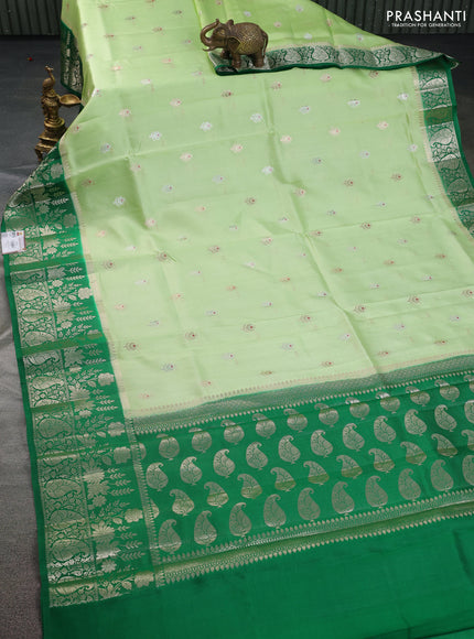 Banarasi poona silk saree pista green and green with silver & gold zari woven buttas and rich zari woven border