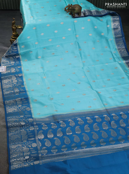 Banarasi poona silk saree light blue and cs blue with silver & gold zari woven buttas and rich zari woven border