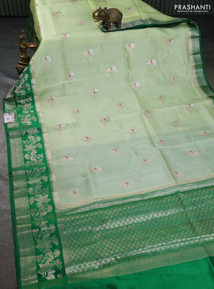 Banarasi poona silk saree pista green and green with zari woven floral buttas and zari woven border