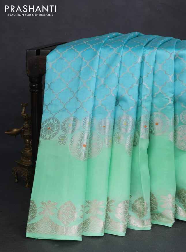 Banarasi poona silk saree light blue and teal green with allover zari woven geometric weaves and long zari woven border
