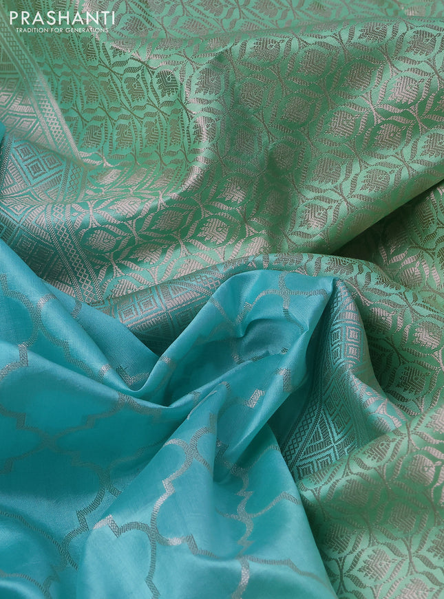 Banarasi poona silk saree light blue and teal green with allover zari woven geometric weaves and long zari woven border