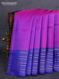 Pure soft silk saree purple and blue with allover zari weaves and zari woven border