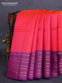 Pure soft silk saree dual shade of pinkish orange and purple with allover zari weaves and zari woven border