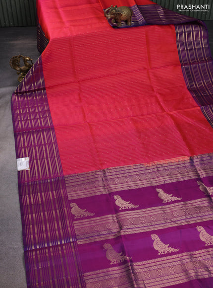 Pure soft silk saree dual shade of pinkish orange and purple with allover zari weaves and zari woven border