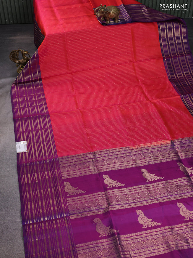 Pure soft silk saree dual shade of pinkish orange and purple with allover zari weaves and zari woven border