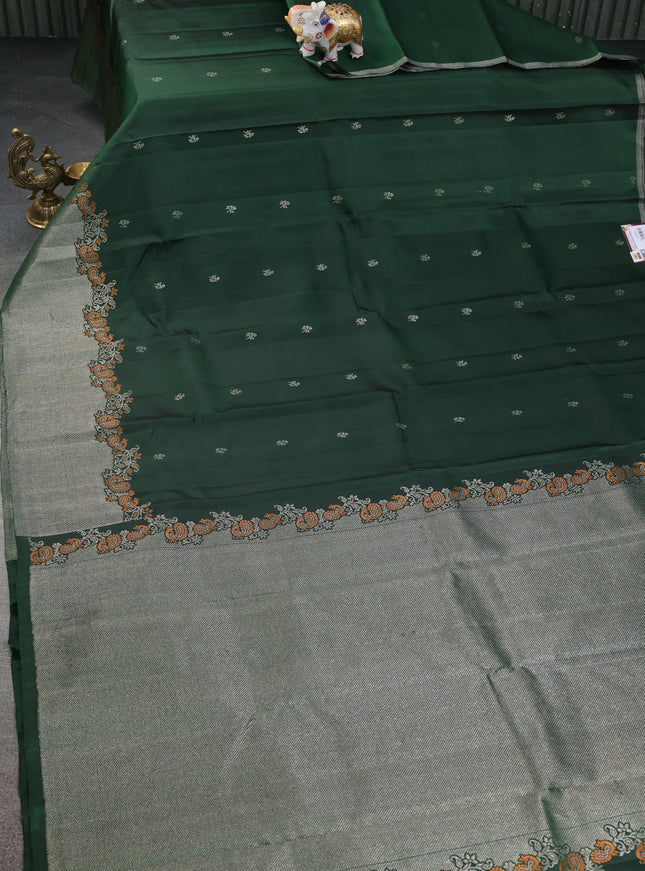 Pure soft silk saree dark green with zari woven buttas and rich zari woven border