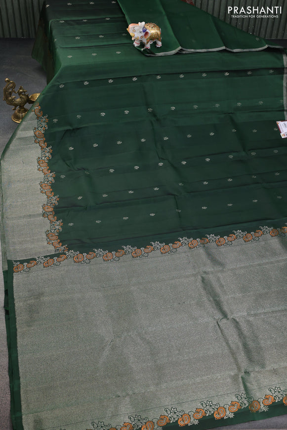 Pure soft silk saree dark green with zari woven buttas and rich zari woven border