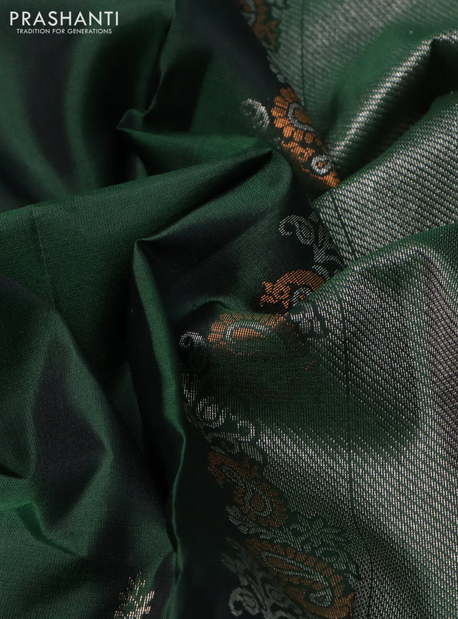 Pure soft silk saree dark green with zari woven buttas and rich zari woven border