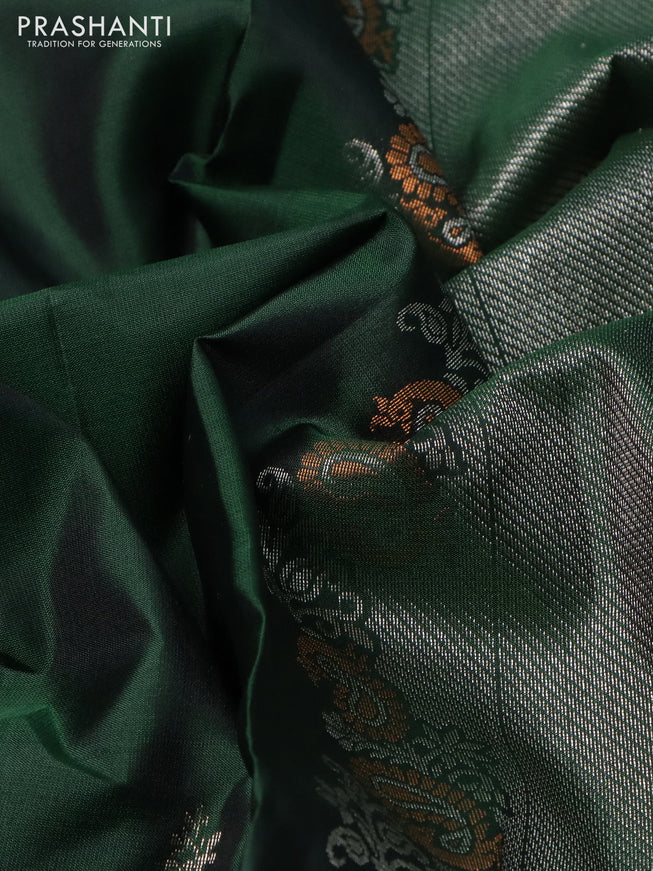 Pure soft silk saree dark green with zari woven buttas and rich zari woven border