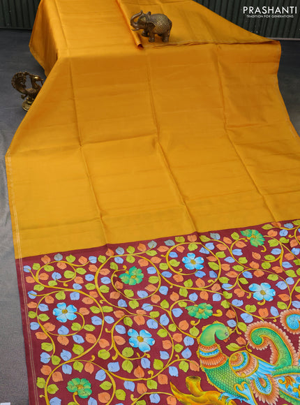 Pure soft silk saree mustard yellow and maroon with plain body and hand painted kalamkari pallu