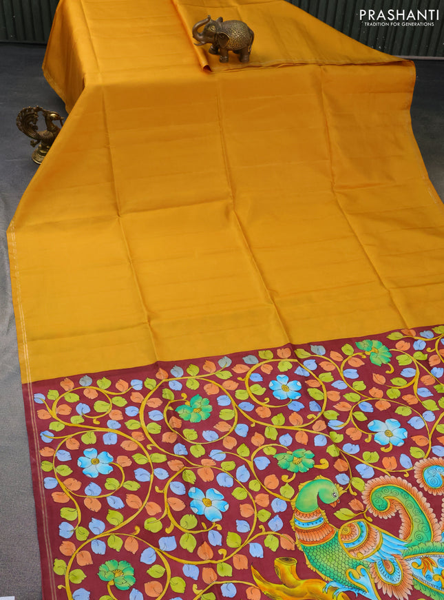 Pure soft silk saree mustard yellow and maroon with plain body and hand painted kalamkari pallu