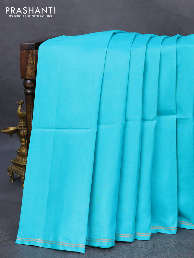 Pure soft silk saree teal blue and brown with plain body and hand painted kalamkari pallu