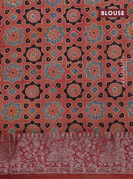 Chiniya silk saree dark green and rust shade with plain body and woven border