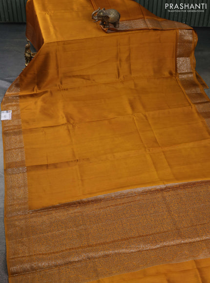Chiniya silk saree dark mustard and rust shade with plain body and woven border