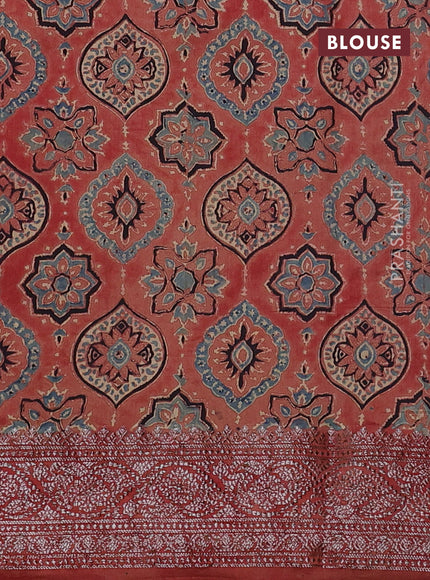 Chiniya silk saree dark green and rust shade with plain body and woven border