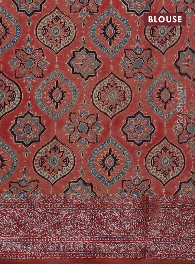 Chiniya silk saree dark green and rust shade with plain body and woven border