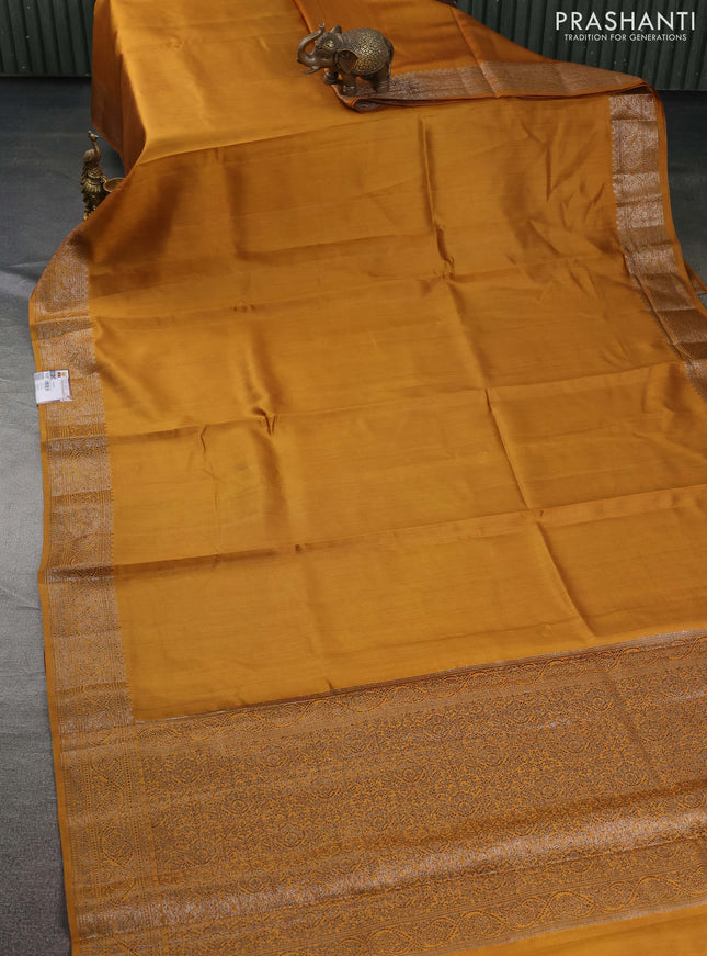 Chiniya silk saree dark mustard and rust shade with plain body and woven border