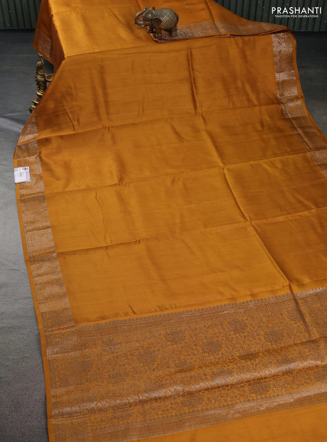 Chiniya silk saree dark mustard and rust shade with plain body and woven border