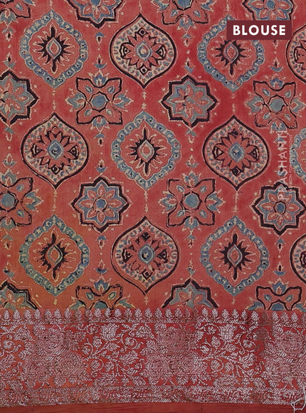 Chiniya silk saree green and rust shade with plain body and woven border