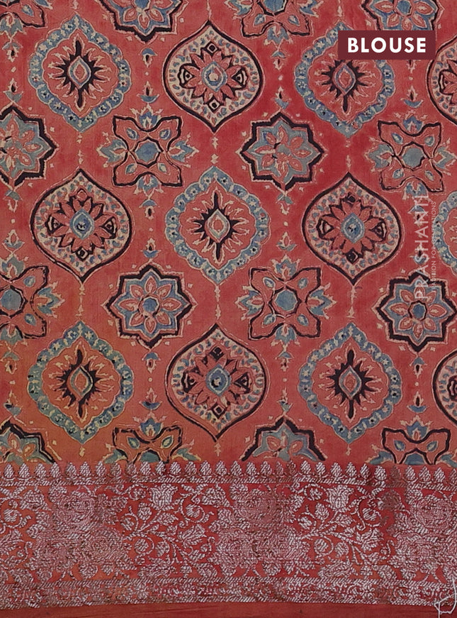 Chiniya silk saree green and rust shade with plain body and woven border