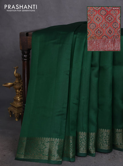Chiniya silk saree green and rust shade with plain body and woven border