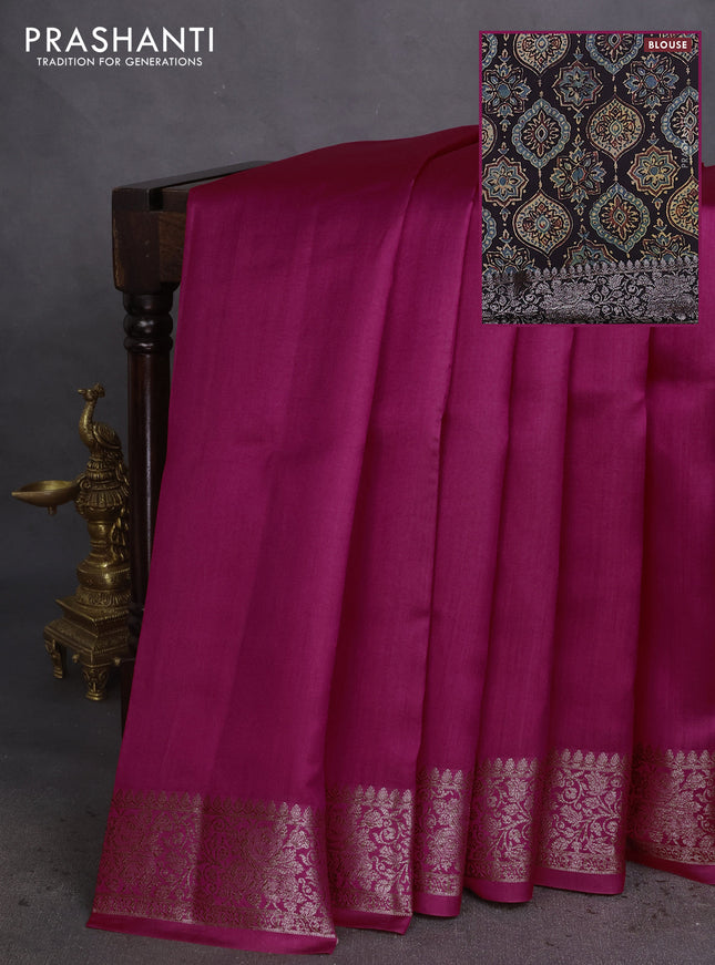 Chiniya silk saree dark pink and black with plain body and woven border