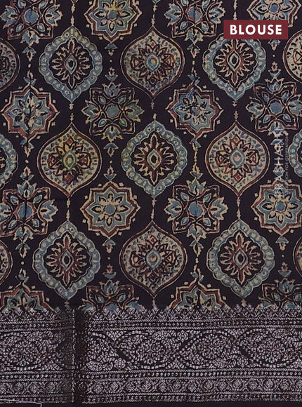 Chiniya silk saree wine shade and black with plain body and woven border