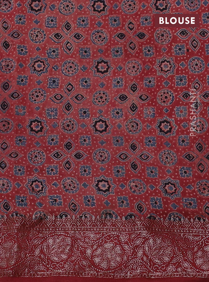 Chiniya silk saree green and maroon with plain body and woven border