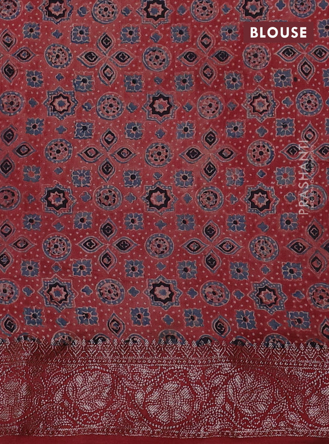 Chiniya silk saree green and maroon with plain body and woven border