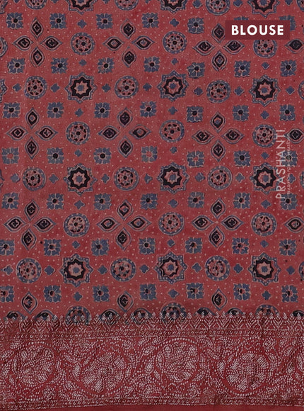 Chiniya silk saree black and maroon with plain body and woven border