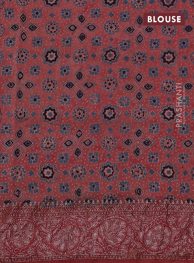 Chiniya silk saree black and maroon with plain body and woven border