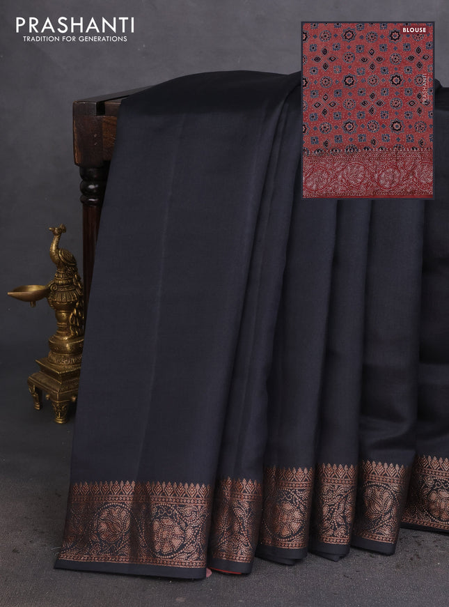 Chiniya silk saree black and maroon with plain body and woven border